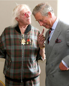 Known child sex trafficker, Jimmy Savile, and Prince Charles.