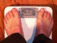 fat people weighed